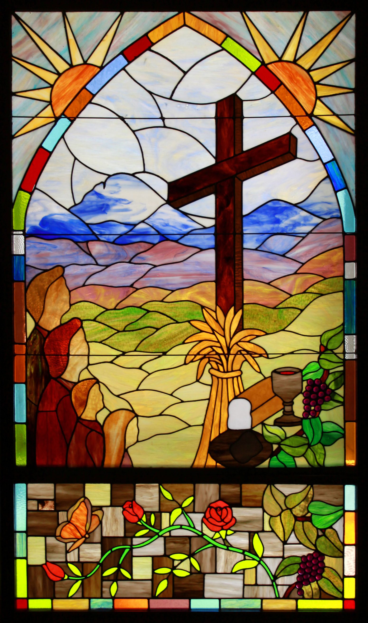 worshipping family stained glass